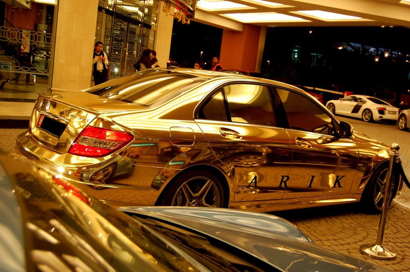 Illustration for article titled Gold Chromed Mercedes C63 AMG Pushes Excess Higher